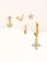 Nora – Delicati orecchini in oro dalla forma chiara.