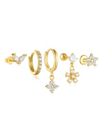 Nora – Delicati orecchini in oro dalla forma chiara.