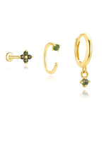 Mona – Orecchini in oro dal design fluido.