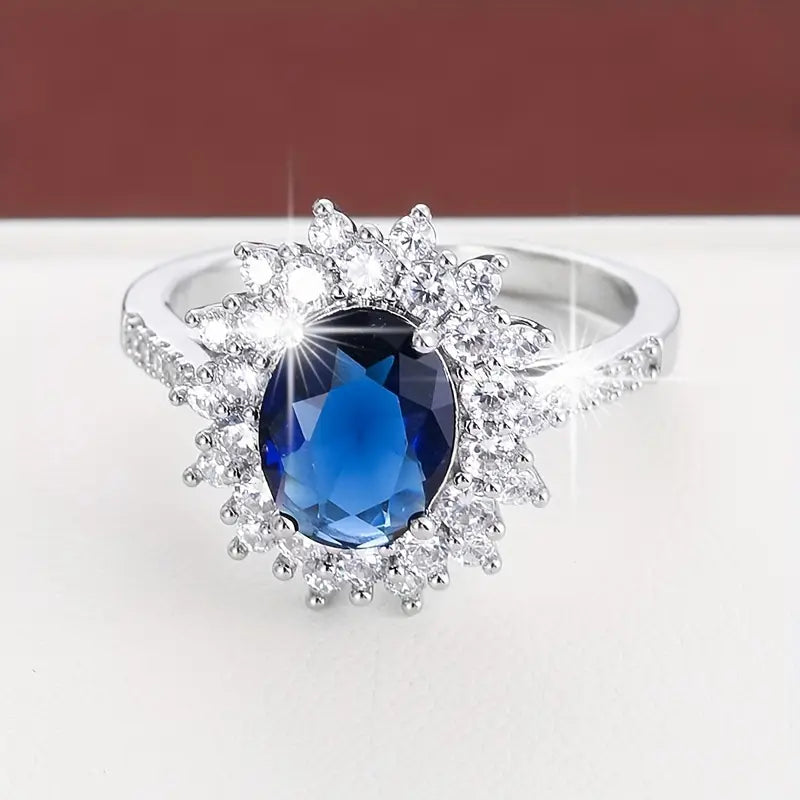 Karolína – Anello placcato oro con zaffiro floreale.