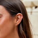 Sabina – Cerchi dorati con un tocco geometrico.
