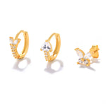 Eva-Marie – Delicati orecchini in oro dalla forma fluida.