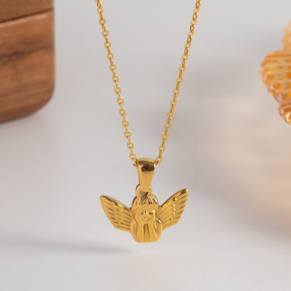Frieda – Collana dorata con pendente a forma di ala