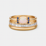 Tereza – Un delicato anello in oro con un opale scintillante e contorni trasparenti.