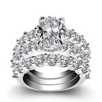 Greta – Anello in argento con diamanti e ornamento.