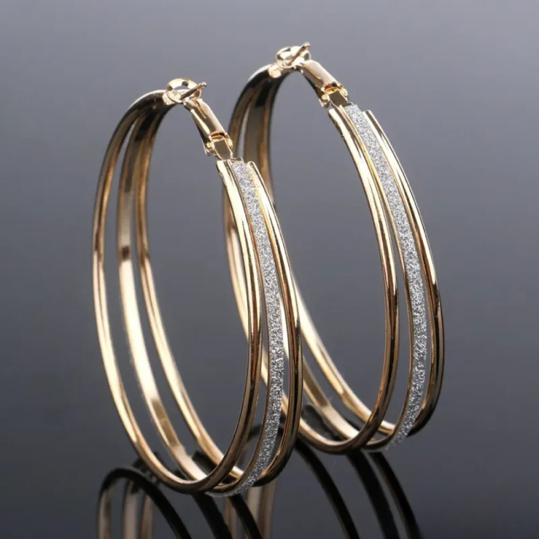Melina – Orecchini in argento con forma allungata