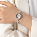 Elina – Orologio in oro con bracciale a fiori.