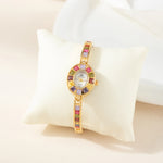 Amélie – Orologio in oro con montatura in cristallo.