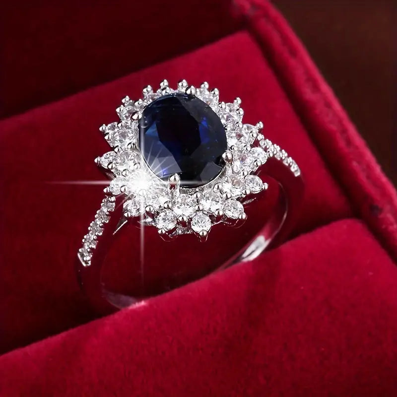 Karolína – Anello placcato oro con zaffiro floreale.