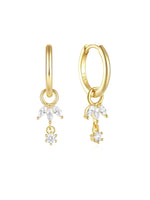 Daniela – Delicati orecchini in oro dalla forma fluida.