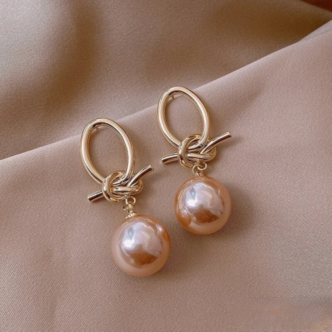 Renata – Orecchini in argento con decorazione in perla