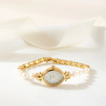 Aurelie – Orologio da donna in oro con quadrante a goccia.