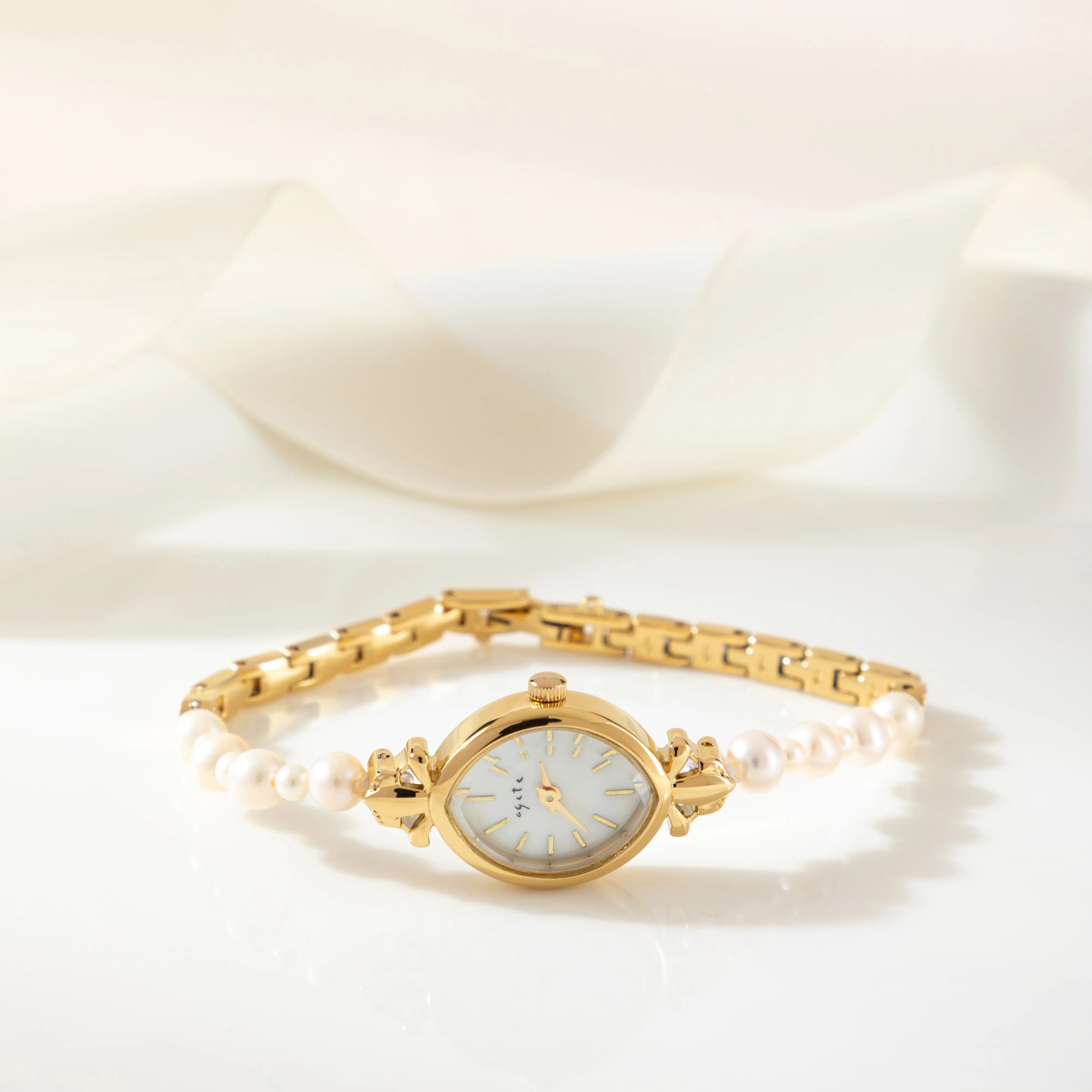 Aurelie – Orologio da donna in oro con quadrante a goccia.