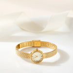 Magdaléna – Orologio in oro con cinturino stretto.