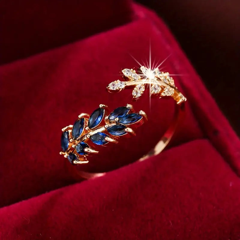 Aurelie – Anello in oro rosso con pietra blu