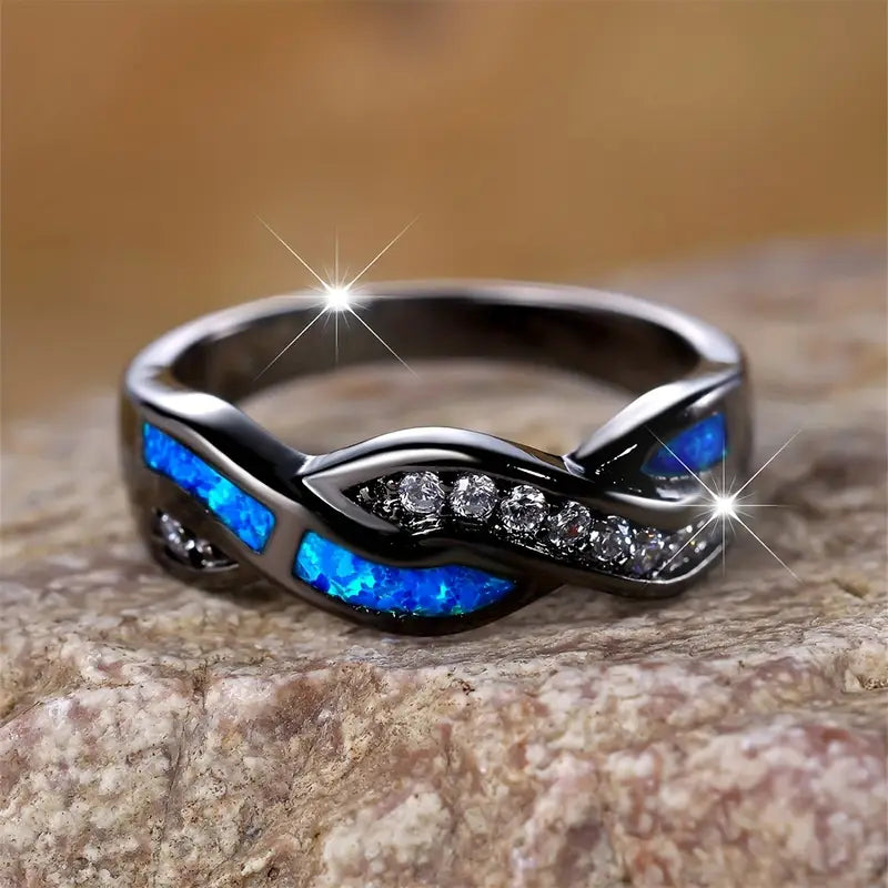 Leonie – Anello in argento con pietra blu scuro.