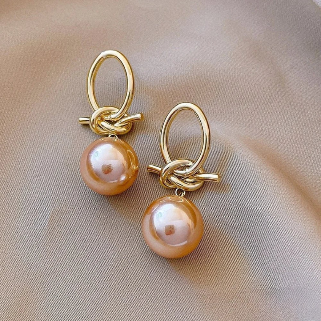 Renata – Orecchini in argento con decorazione in perla