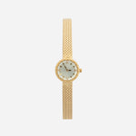 Magdaléna – Orologio in oro con cinturino stretto.