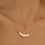 Juliana – Collana dorata dalla struttura minimalista