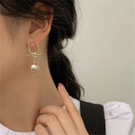 Renata – Orecchini in argento con decorazione in perla