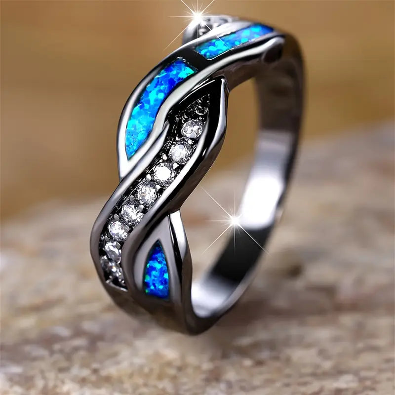 Leonie – Anello in argento con pietra blu scuro.