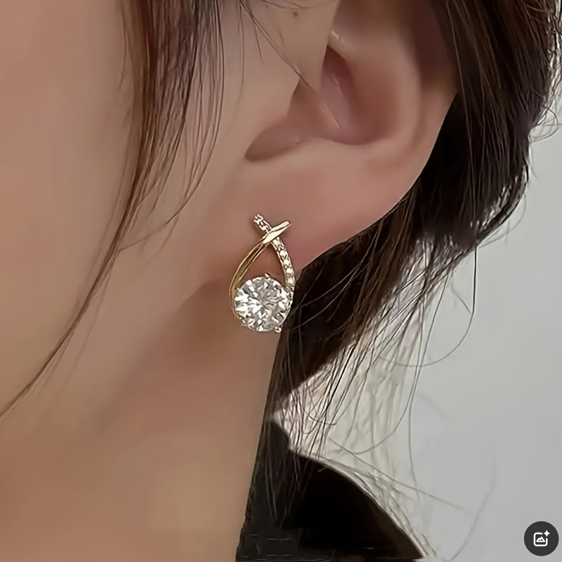 Leni – Orecchini dorati con croce e zirconi