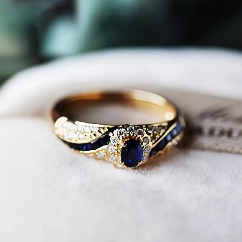 Beatrix – Anello placcato oro con doppia pietra.