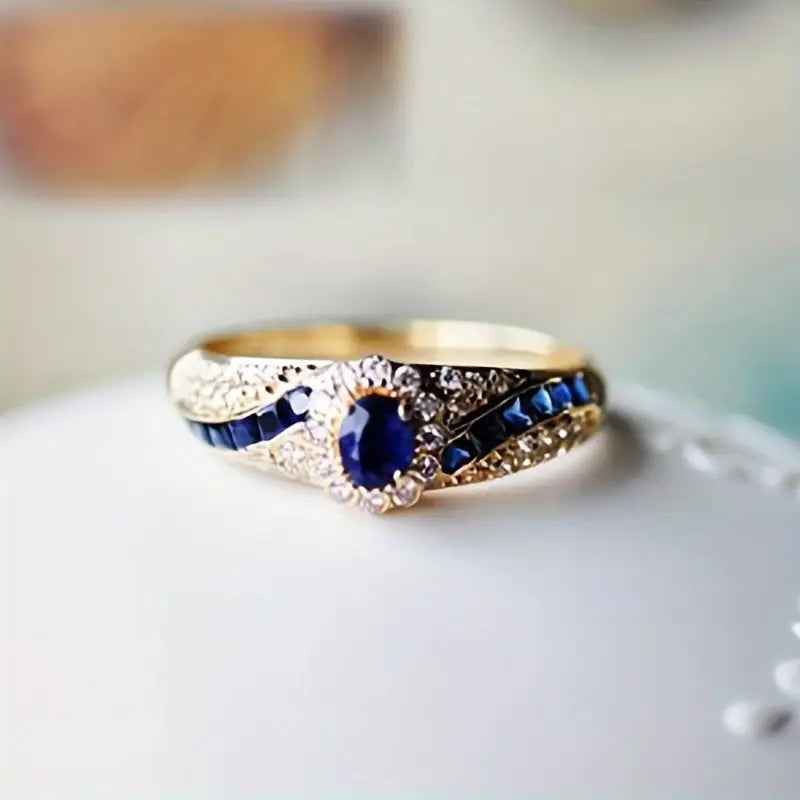 Beatrix – Anello placcato oro con doppia pietra.