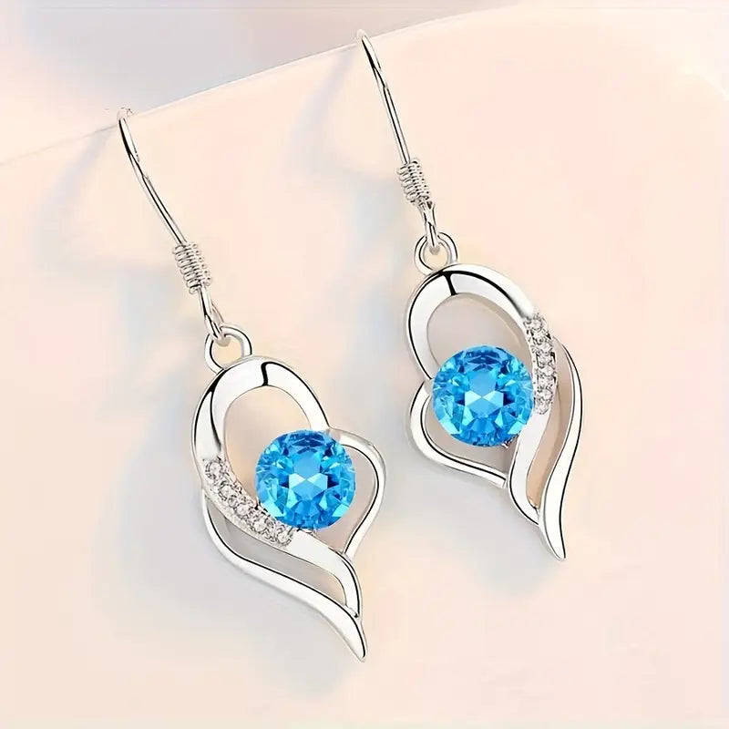 Saphira – Orecchini con pietre blu brillante.