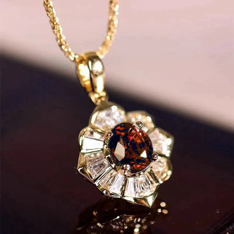 Kristýna – Anello in oro con rubino con disegno floreale.