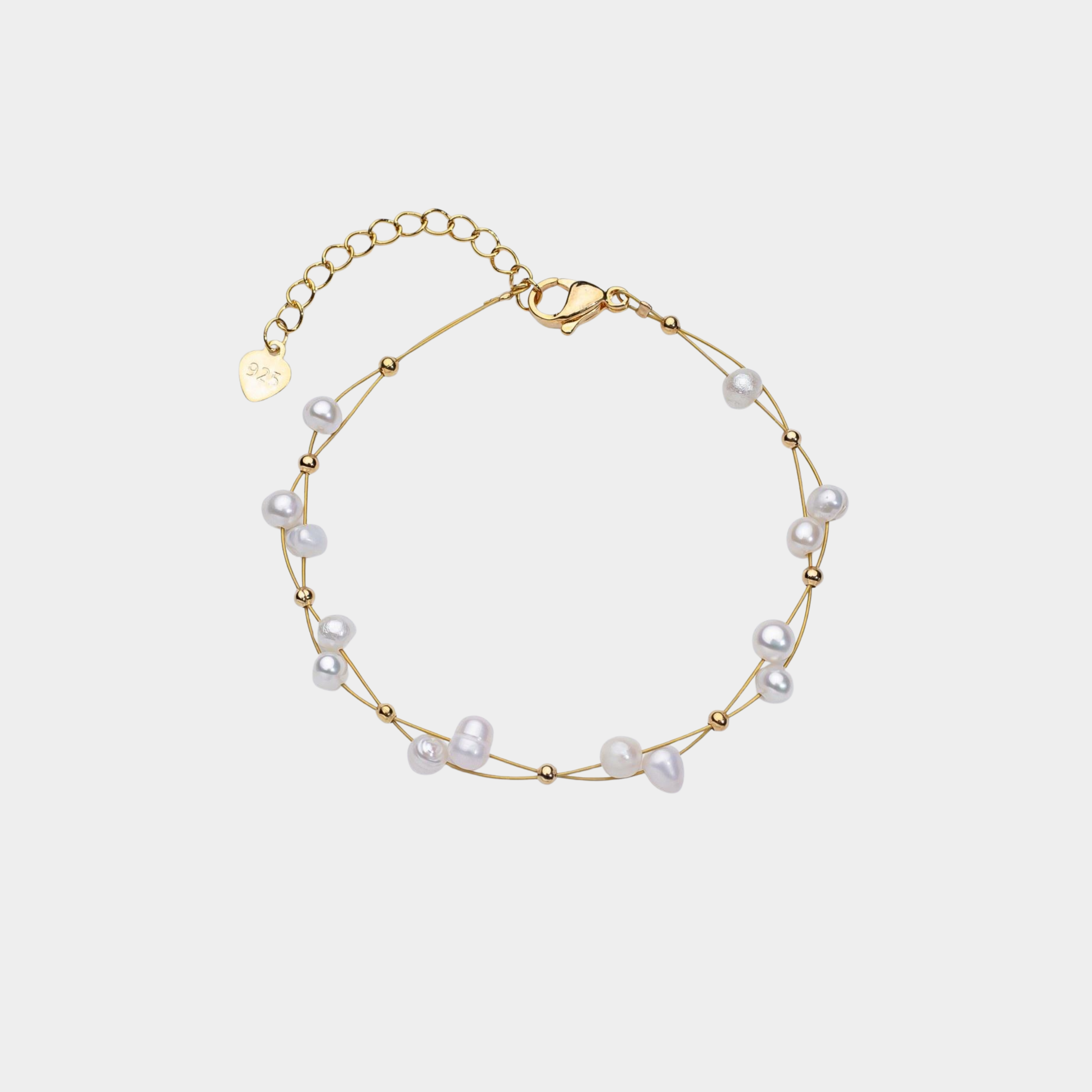 Marlena – Bracciale in oro con dettagli di perle.