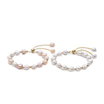 Carina – Orecchini in oro con perle mobili.