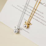 Johana-Luisa – Orecchini in oro con doppia perla.