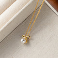 Johana-Luisa – Orecchini in oro con doppia perla.