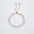 Carina – Orecchini in oro con perle mobili.