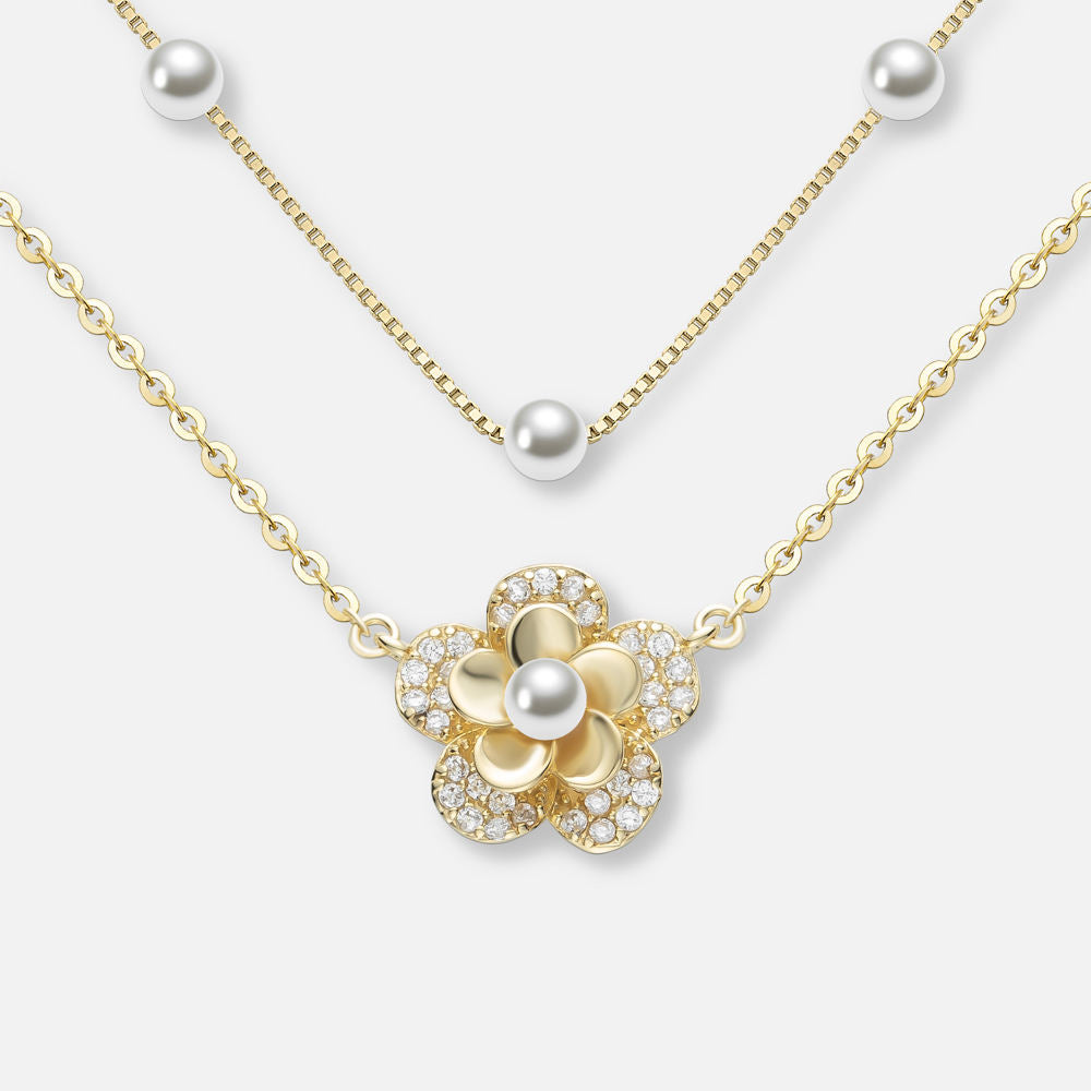 Paul-Marie – Orecchini in oro con bordo di perle.
