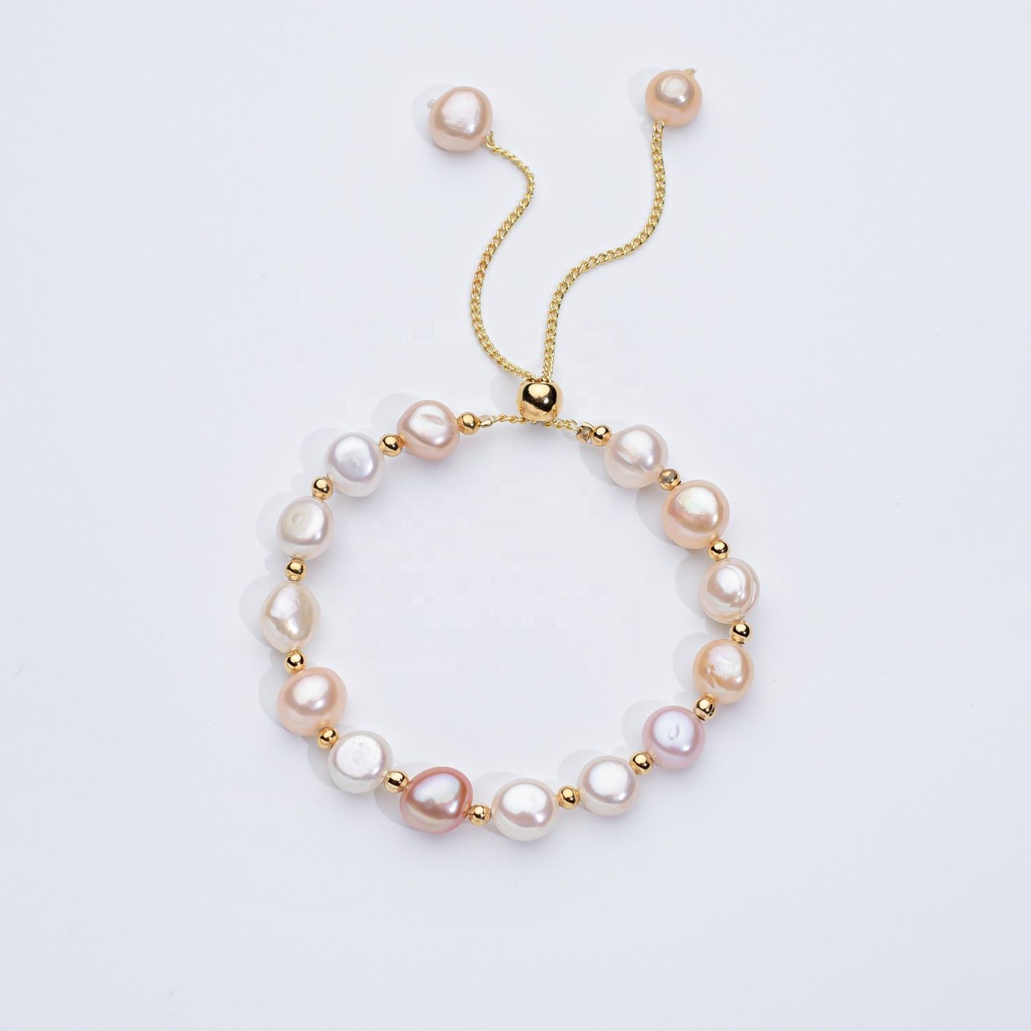 Carina – Orecchini in oro con perle mobili.