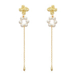 Victoria – Collana di perle con riflessi dorati.