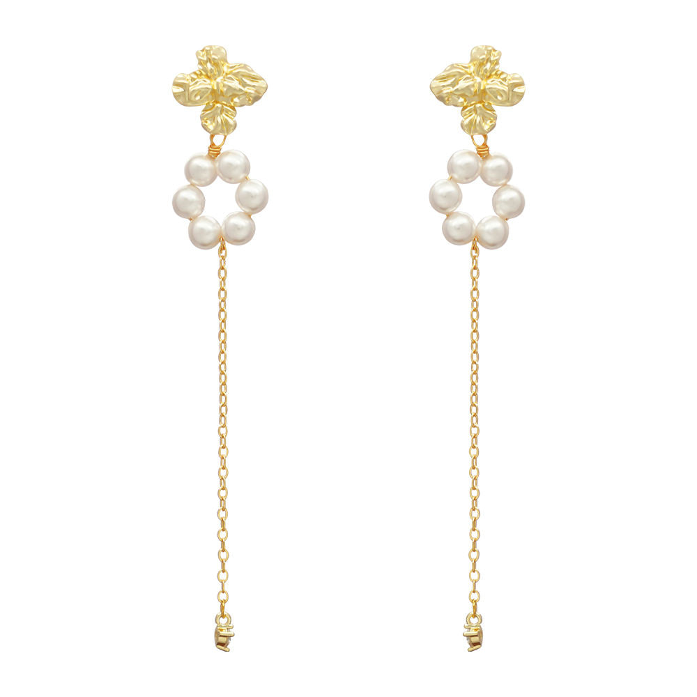 Victoria – Collana di perle con riflessi dorati.