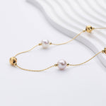Jana – Orecchini di perle minimalisti con borchie.