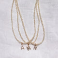 Miriam – Collana dorata doppia con pendente
