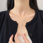 Johana-Luisa – Orecchini in oro con doppia perla.