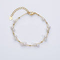 Marlena – Bracciale in oro con dettagli di perle.