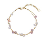 Marlena – Bracciale in oro con dettagli di perle.