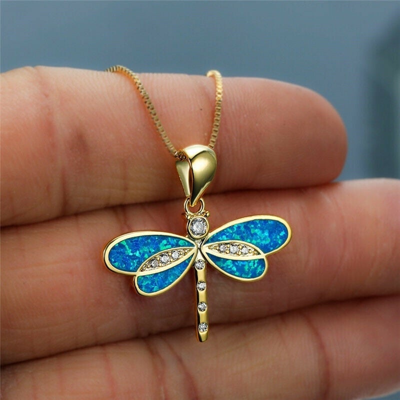 Collana dorata a farfalla con opale