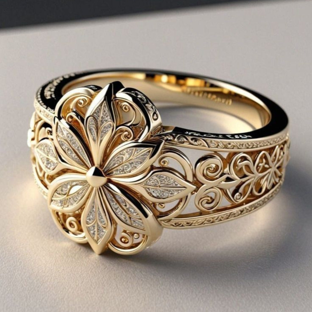 Daniela - Anello in oro con motivo floreale esotico di zirconi