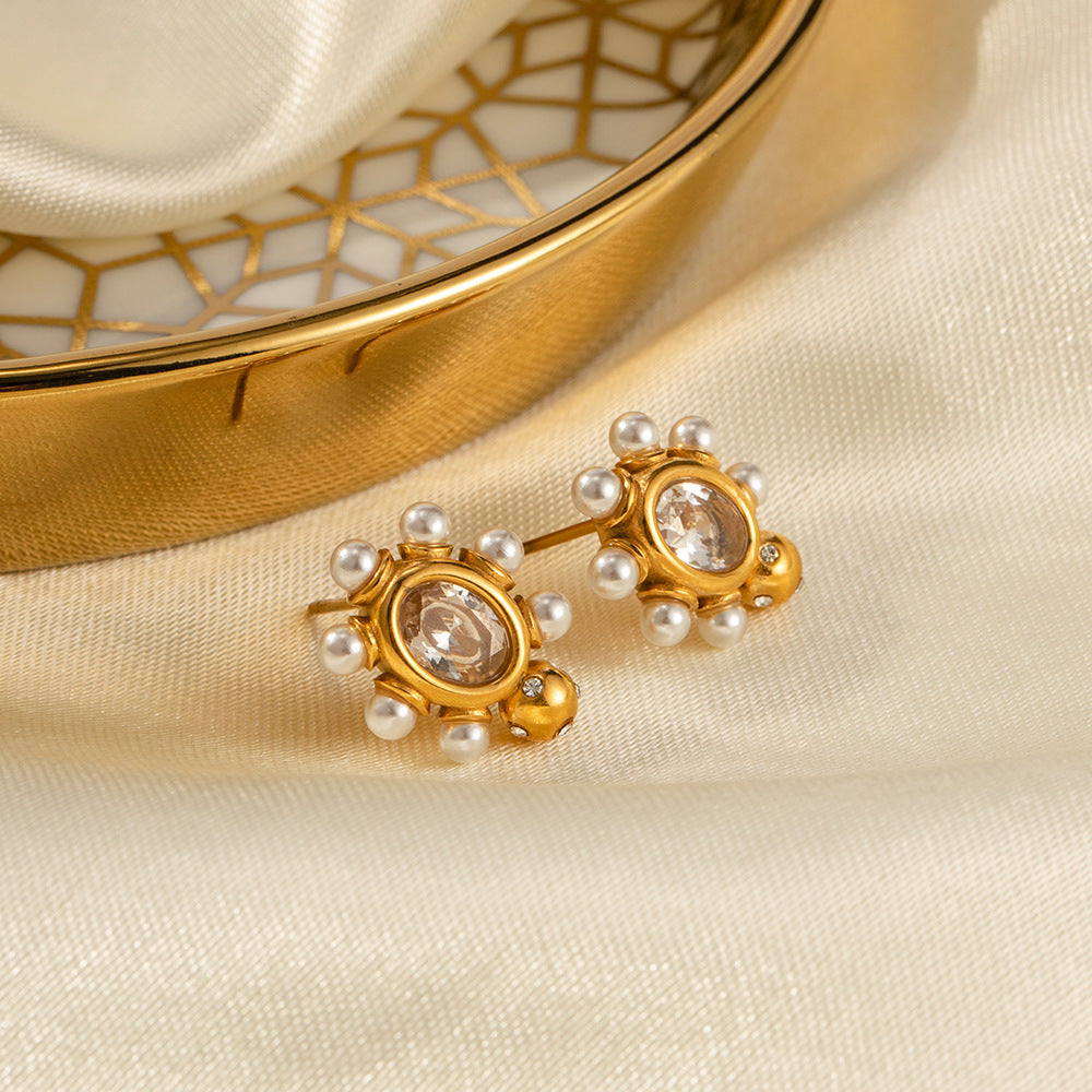Theresa – Orecchini dorati con fiori scintillanti