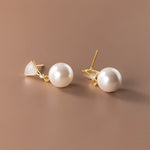 Lore – Orecchini dorati con perle