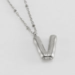 Irena – Collana dorata con charme a forma di iniziale
