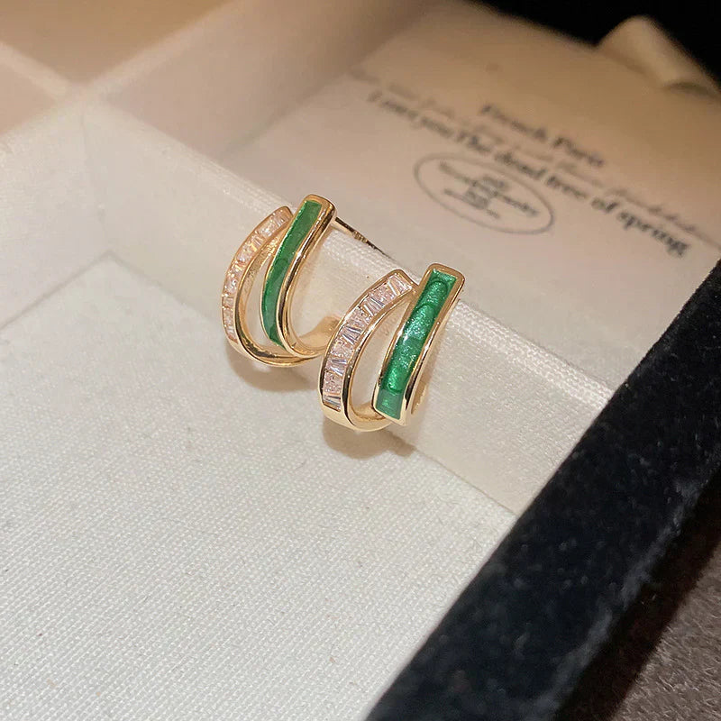 Karina – Orecchini di smeraldi dal design quadrato.